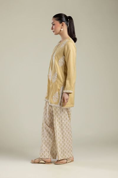 Embroidered | Textured Weave | Beige Printed Pants | AED 100.00